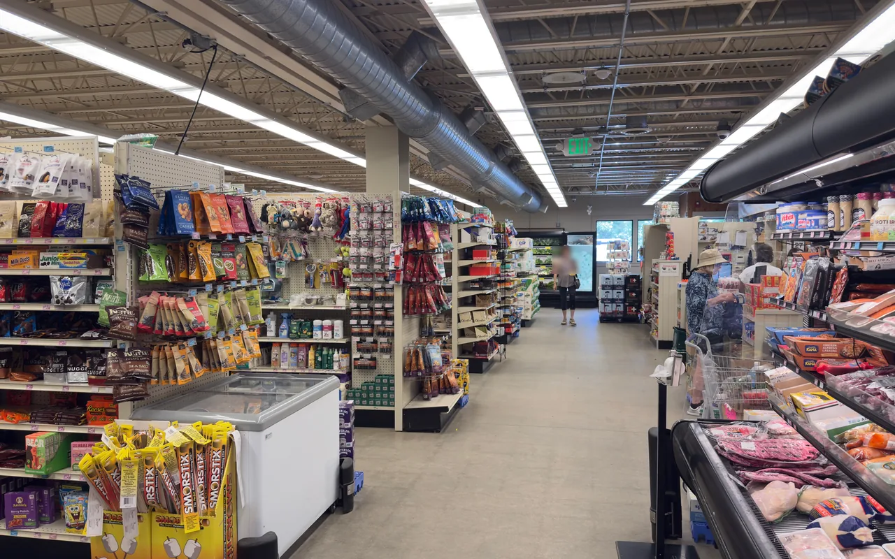 Inside Cronig's Up-Island market in West Tisbury with snack shelves and the meat case