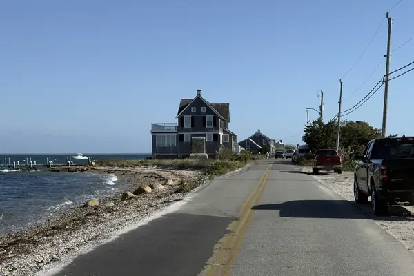 Parked cars on a shore road on East Chop