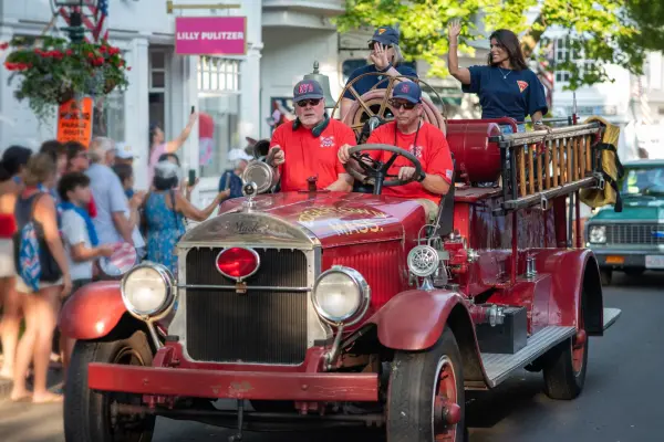 A classic antique fire engine in the Edgartown Fourth of July parade