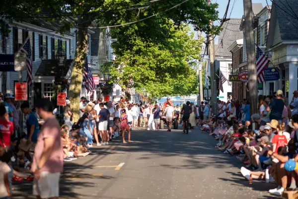 Crowds lining Main Street down to the harbor for the Edgartown Fourth of July parade