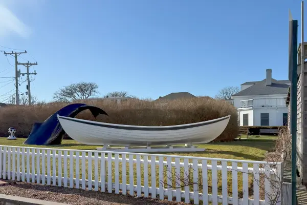 Whaleboat and whale tail memorial near Memorial Wharf, Edgartown
