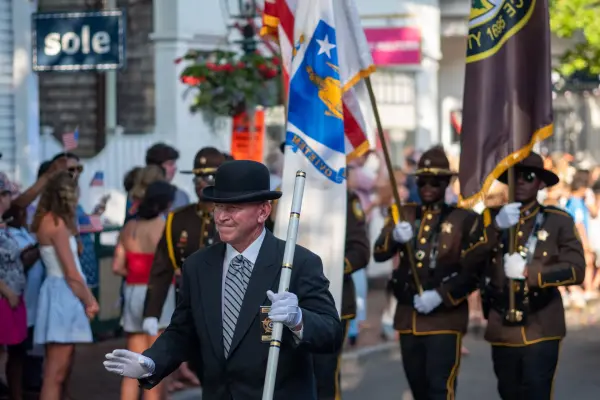 The Dukes County Sheriff leading the color guard in the Edgartown Fourth of July parade