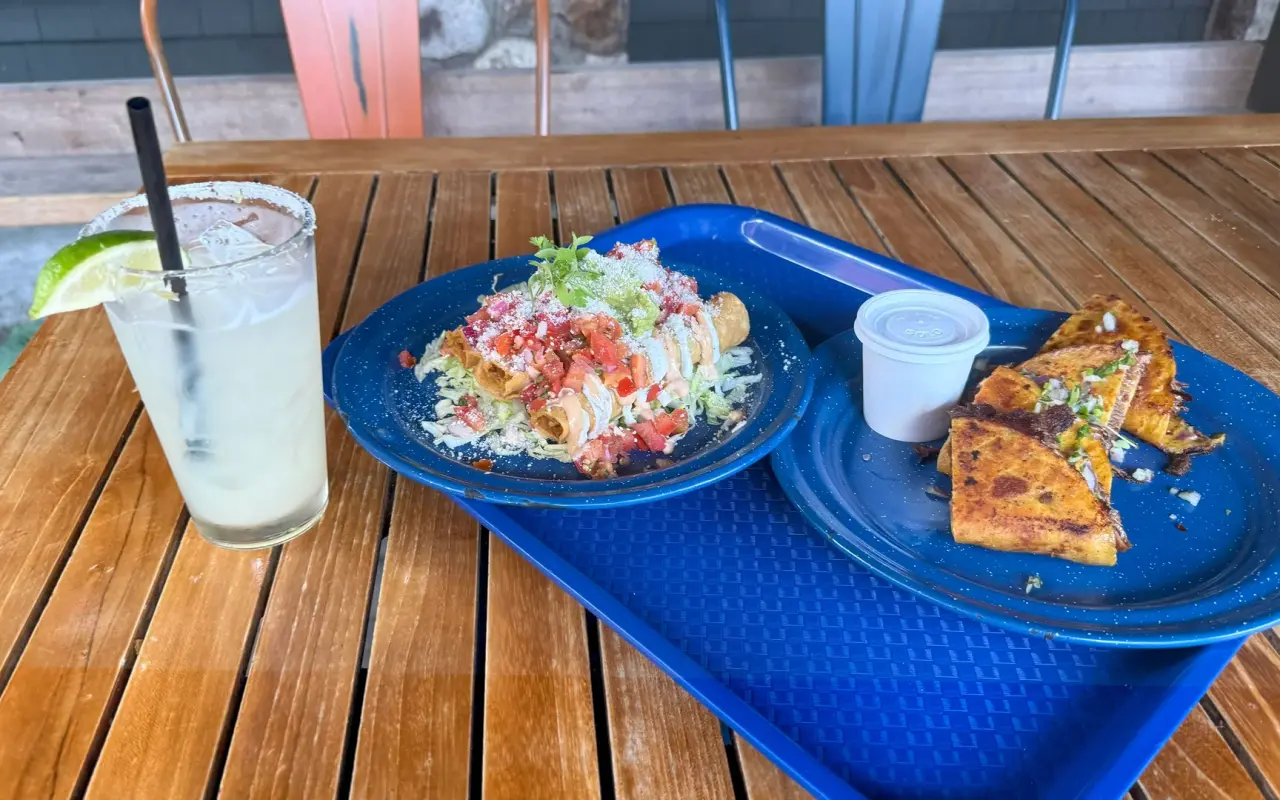 Taquitos, quesadillas and a margarita served on a blue tray at El Barco in Vineyard Haven