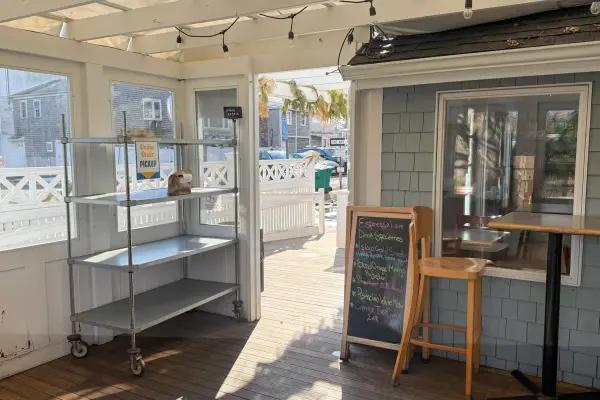 Espresso Love's porch and pickup shelf in the quiet season.