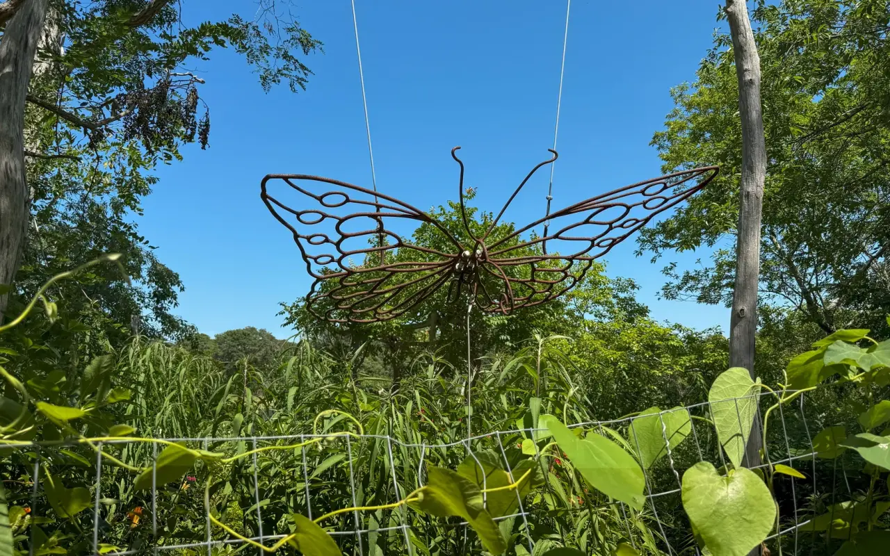 Butterfly sculpture above the pollinator garden at Felix Neck
