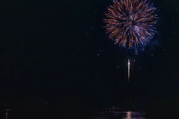 A golden firework bursting over Edgartown, Fourth of July 2026