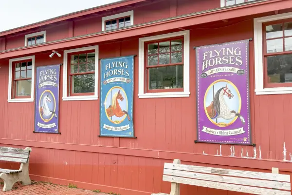 Flying Horses Carousel 150th anniversary banners (1876–2026) · America's oldest platform carousel
