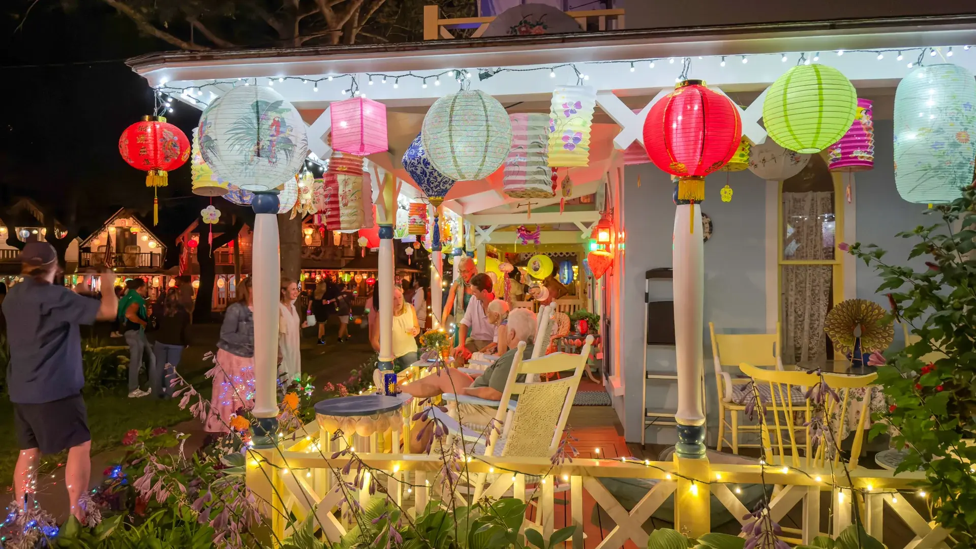 Porch by porch, every cottage its own constellation of lanterns