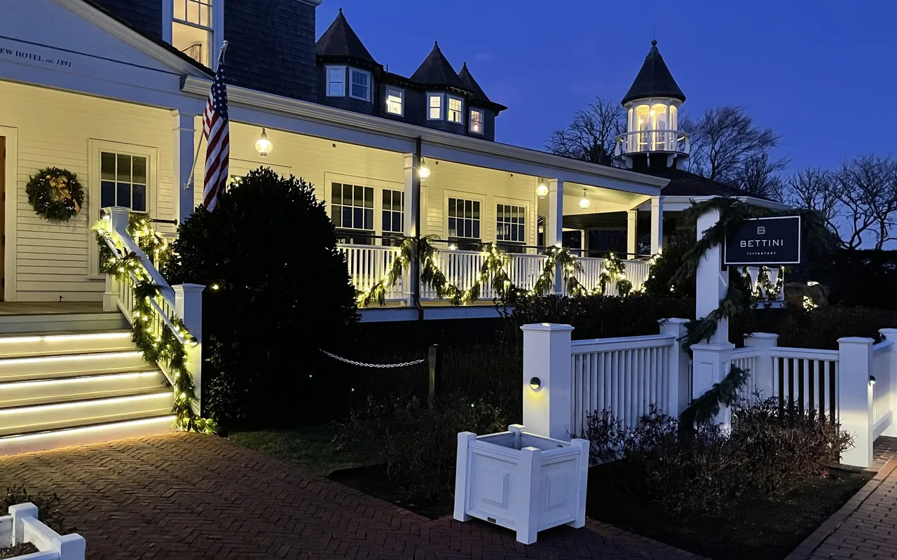 Harbor View Hotel in Edgartown lit with Christmas lights at dusk
