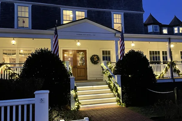 The Harbor View Hotel entrance in December, accessible route sign on the gatepost.