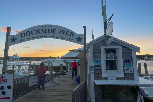 Dockside Pier sign for the Hy-Line ferry at sunset