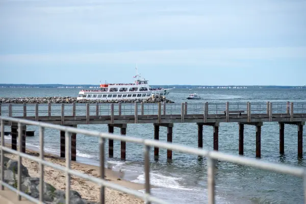 The Island Queen passing the Oak Bluffs fishing pier