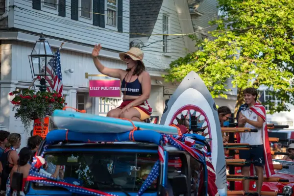 The Island Spirit paddle-sports float with a great-white-shark prop in the Edgartown Fourth of July parade