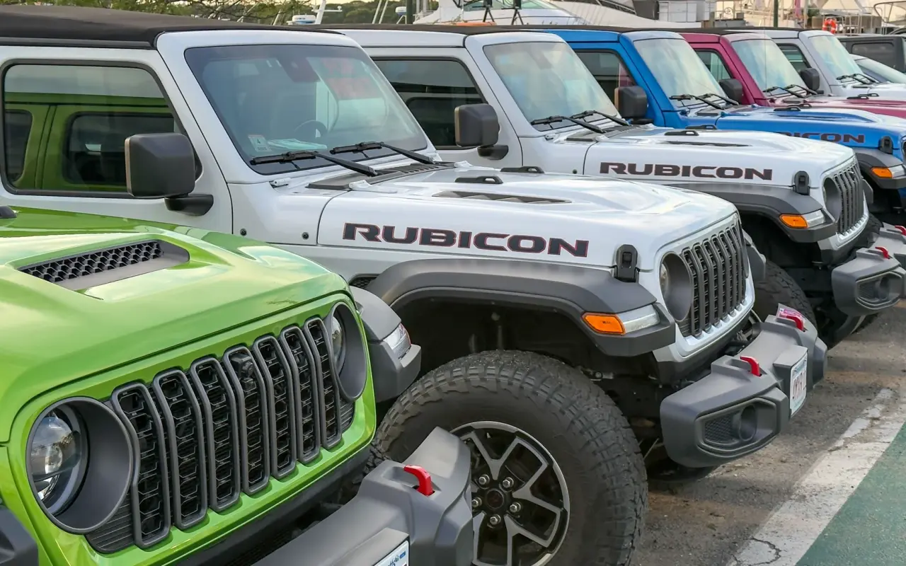 Row of rental Jeeps at a car rental lot in Oak Bluffs