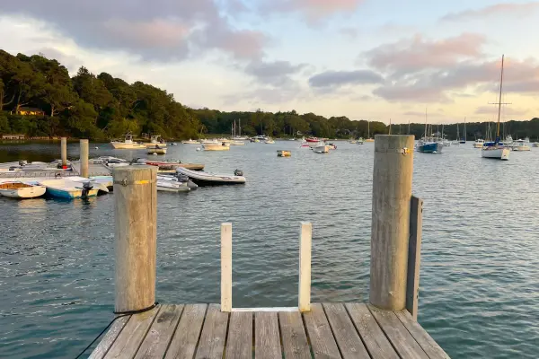 Lake Tashmoo anchorage seen from a wooden dock