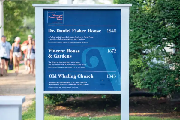 The Vineyard Preservation Trust landmark sign for the Dr. Daniel Fisher House, Vincent House and Old Whaling Church, Edgartown