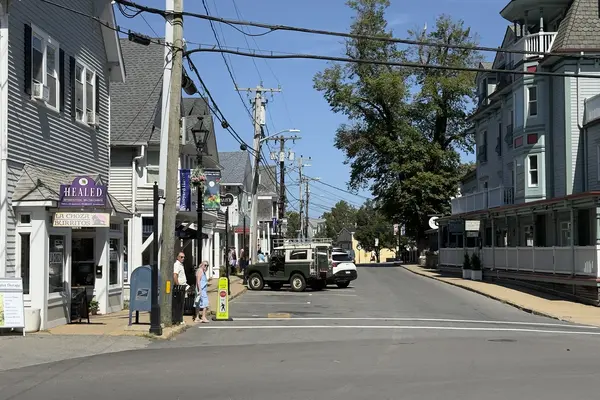 Main Street from the Five Corners end, with the Mansion House porches, September 2026