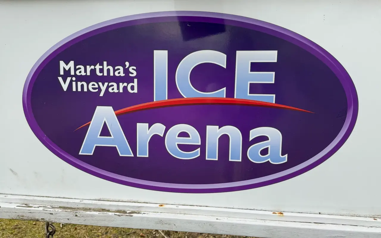Purple oval sign of the Marthas Vineyard Ice Arena in Oak Bluffs