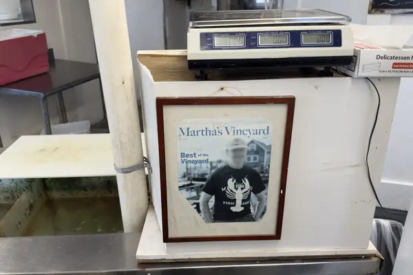 A framed magazine cover by the scale at Menemsha Fish Market