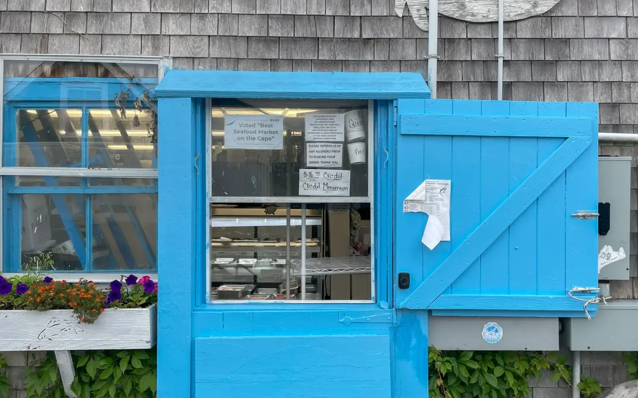 The bright blue takeout window at a Menemsha fish market