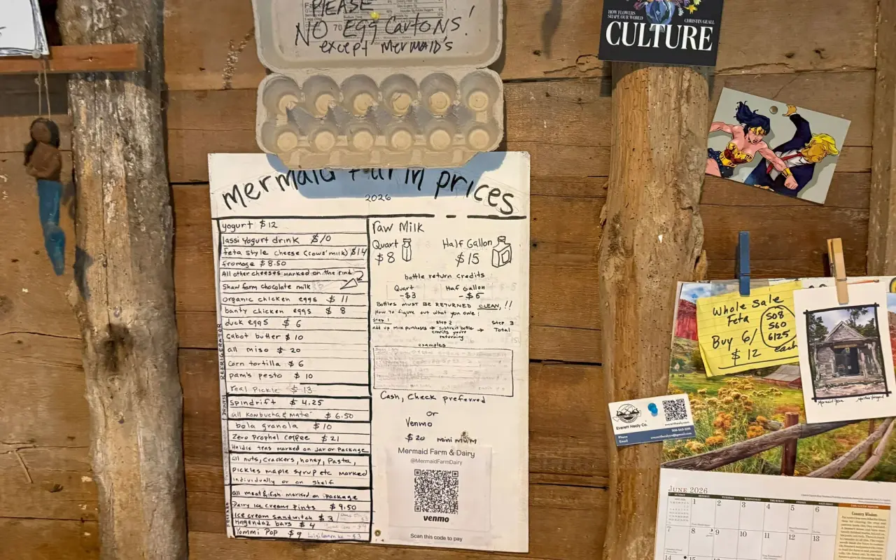 Handwritten price board inside the Mermaid Farm stand