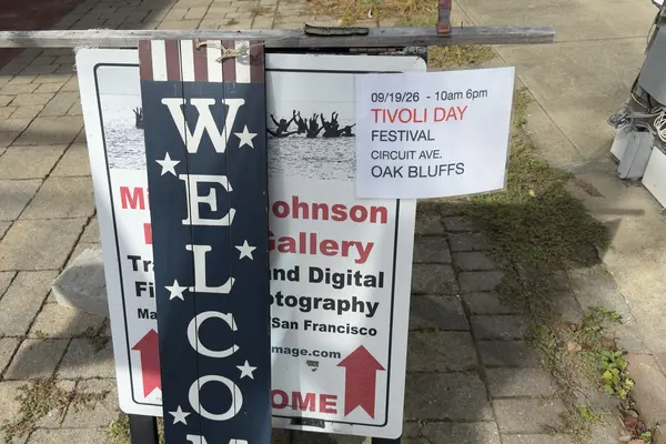 The gallery sandwich board with a Tivoli Day notice, Vineyard Haven