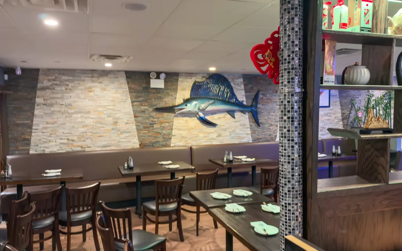Dining room of Mikado Asian Bistro in Vineyard Haven with a mounted sailfish on the stone wall