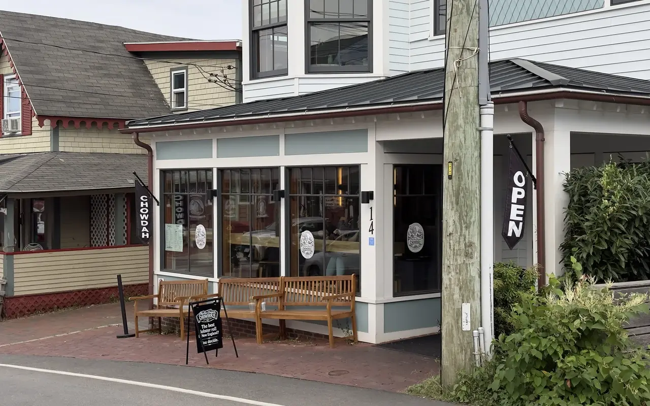 The Martha’s Vineyard Chowder Company storefront at 14 Kennebec Avenue with benches and an Open flag