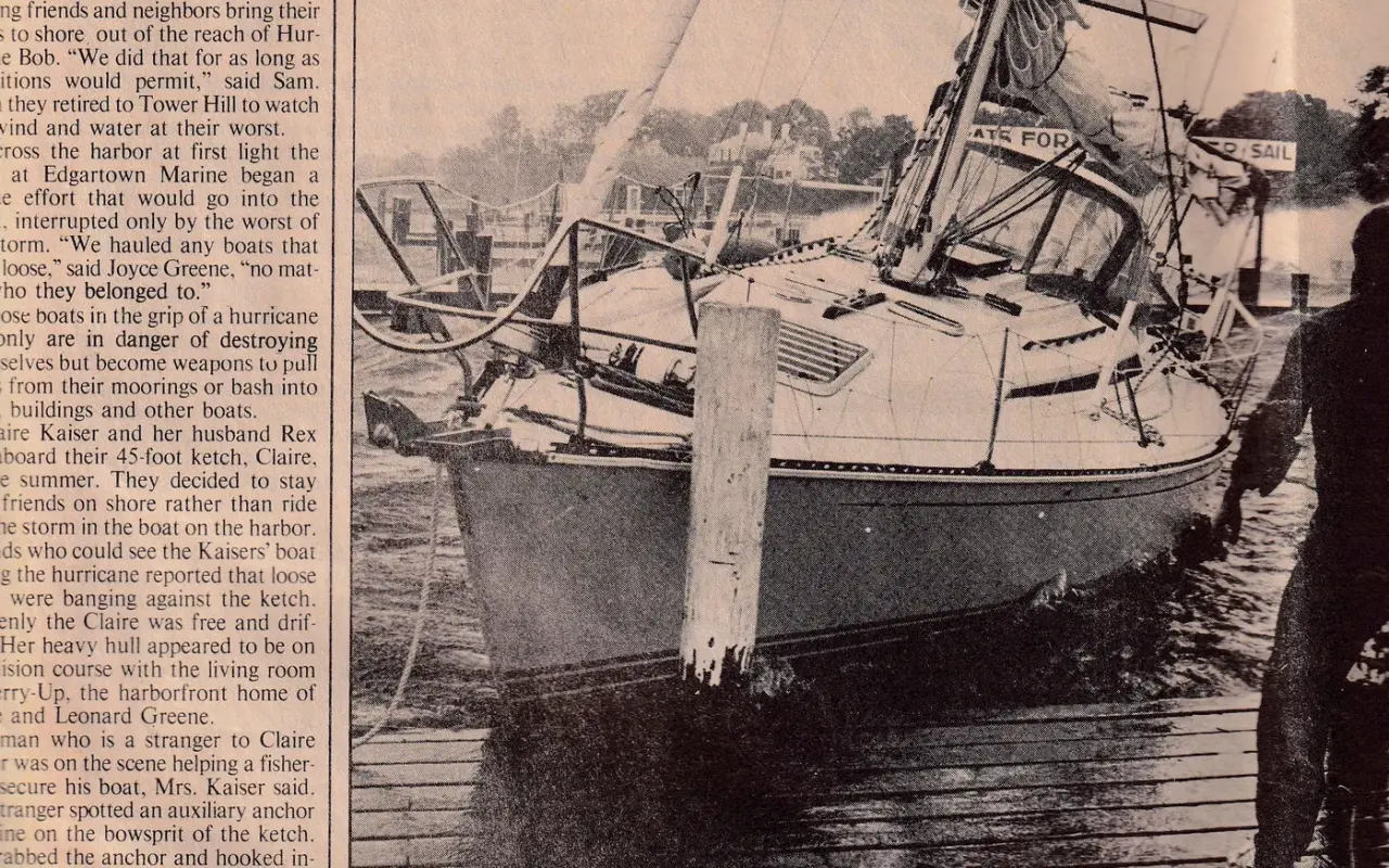 Newspaper photo of a sailboat driven against a dock in Edgartown after Hurricane Bob