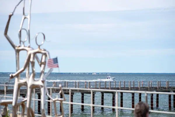 The steel figures at the foot of the Oak Bluffs fishing pier