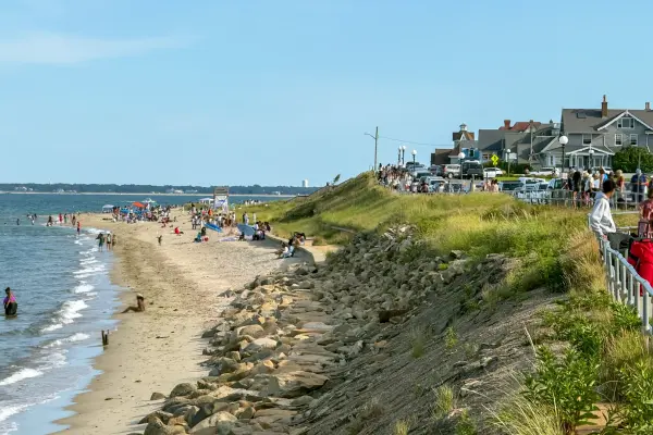 Oak Bluffs town beach on a busy August day, the Inkwell in the distance