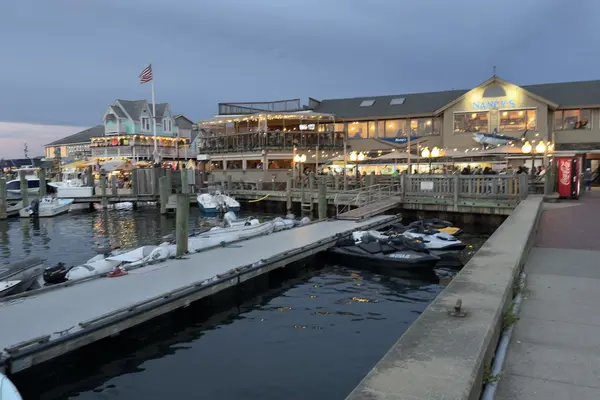 Oak Bluffs harbor at dusk, Nancy's and the deck next door lit up