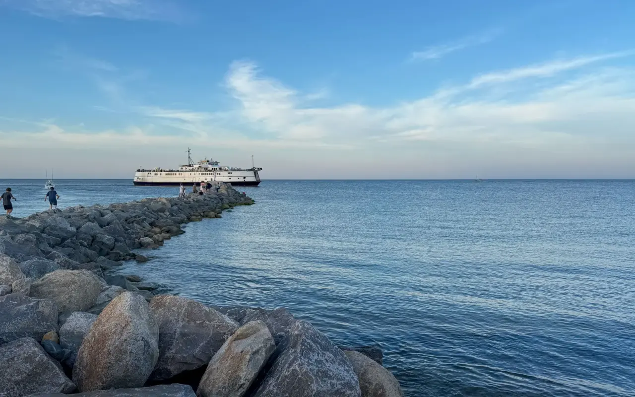 Ferry arriving beyond the rock jetty at Oak Bluffs