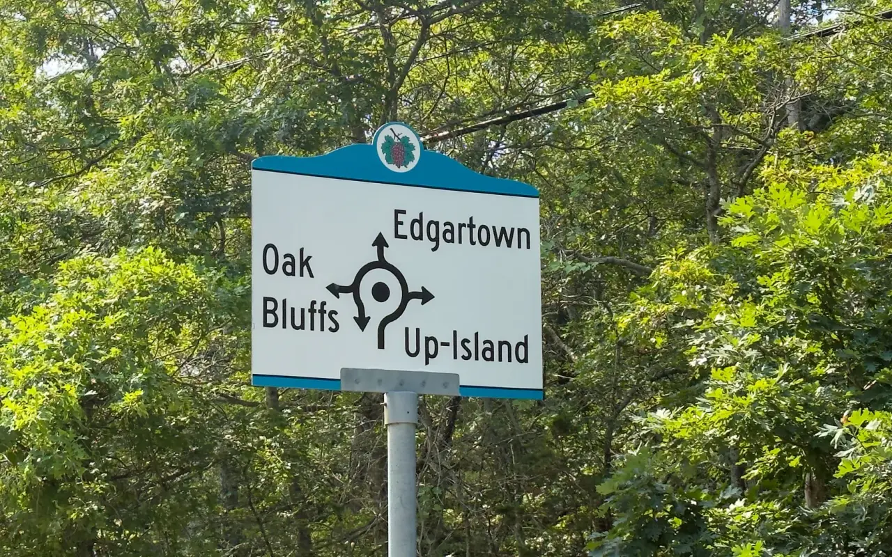 Road sign in Oak Bluffs pointing to Up-Island and Edgartown