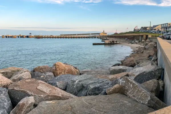 The seawall walk between the ferry wharf and the town beach