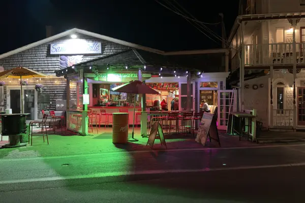 The Sand Bar and Grille on the harbor at night