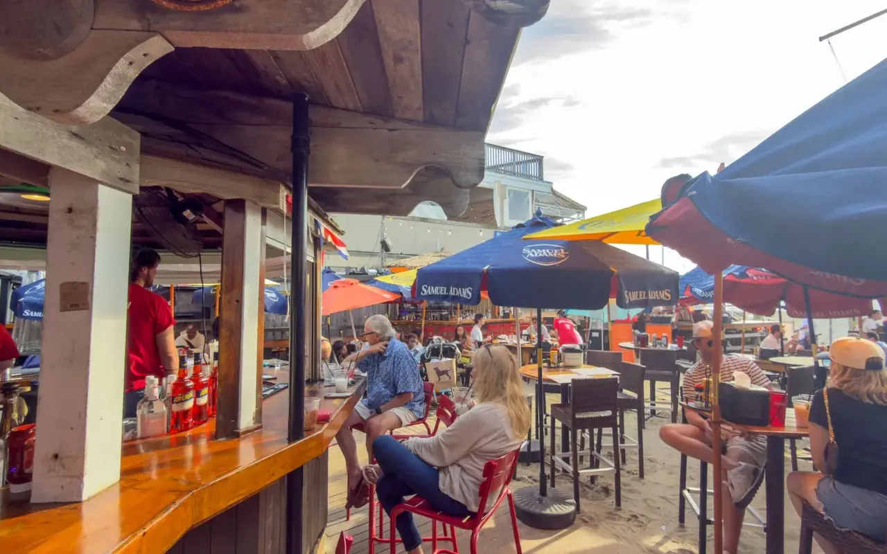 Crowded patio at the Sand Bar and Grille on Oak Bluffs harbor