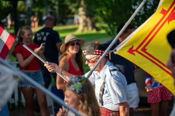 A kilted Scottish standard-bearer with the Royal Standard of Scotland in the Edgartown parade
