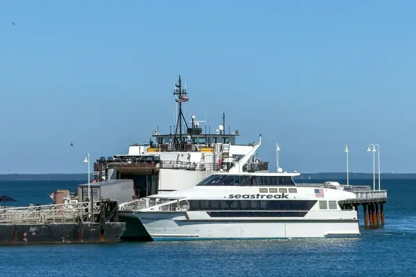 The Seastreak catamaran at the Oak Bluffs pier, Steamship ferry behind.
