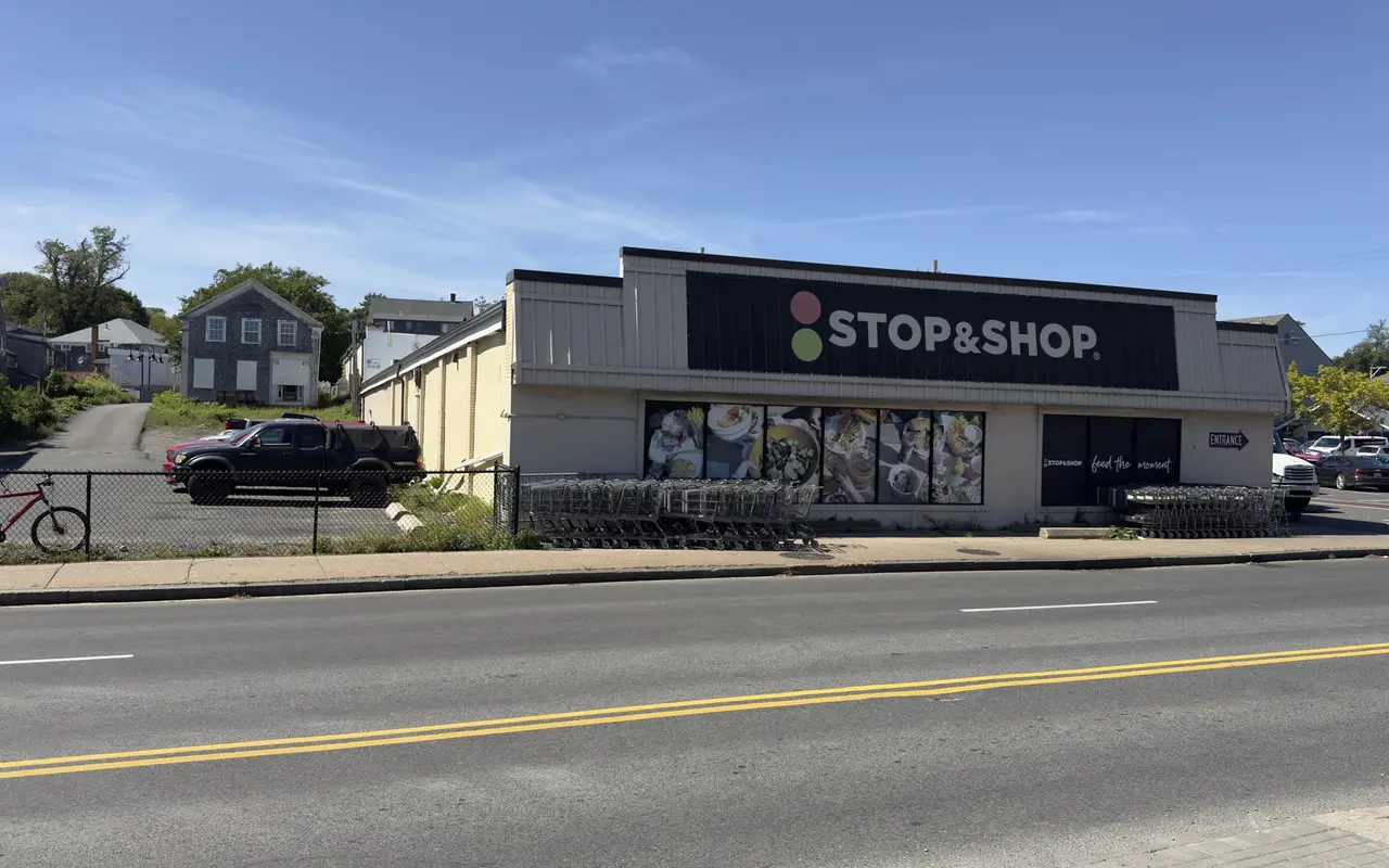 The Stop and Shop supermarket on Water Street in Vineyard Haven, seen from across the road, with rows of carts outside and the entrance sign