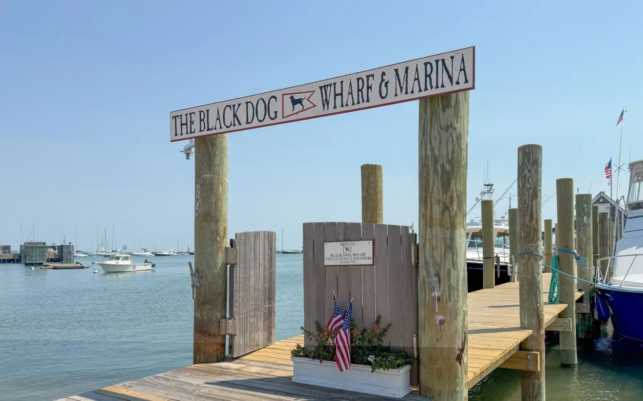 The Black Dog Wharf and Marina sign over the dock in Vineyard Haven