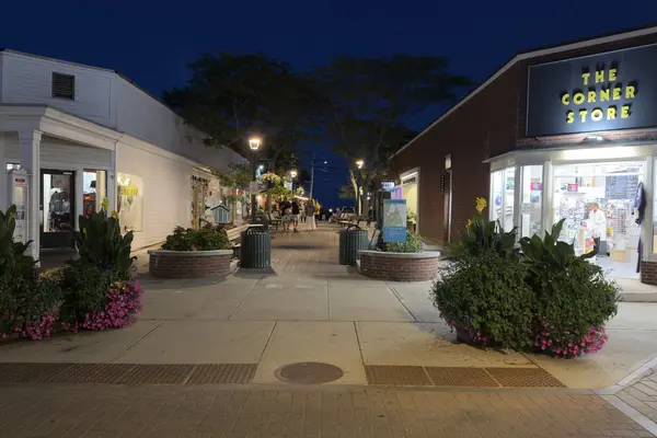 The Corner Store and the Kennebec Avenue plaza at dusk