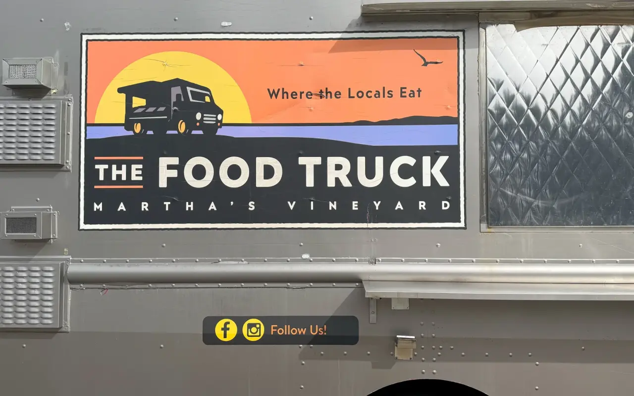Side of The Food Truck on Marthas Vineyard painted with the slogan where the locals eat