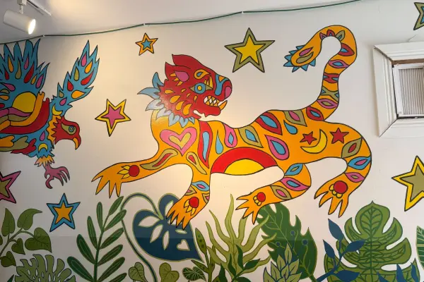 Hand-painted tiger mural inside Tigerhawk Sandwich Co., Oak Bluffs