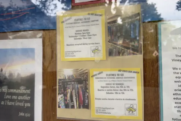 Clothes to Go flyers on the Trinity church board: free clothing at the Stone Church in Vineyard Haven