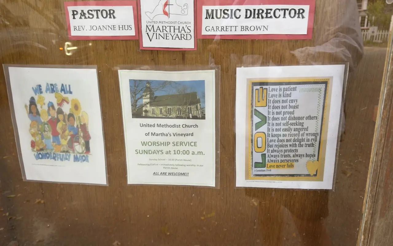 The glass notice board at Trinity Methodist Church in Oak Bluffs: United Methodist Church of Martha's Vineyard, worship service Sundays at 10 a.m., Sunday school in the Parish House, all are welcome