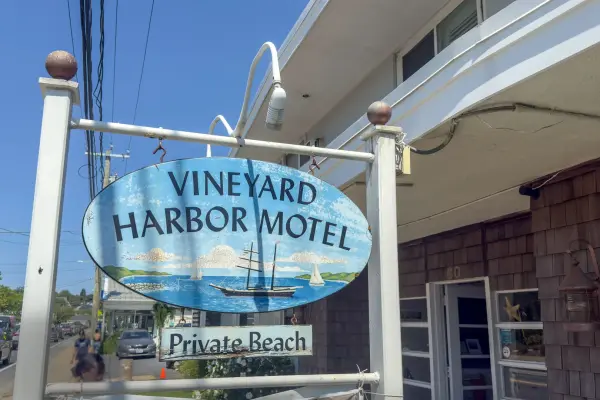 Hand-painted sign at the Vineyard Harbor Motel advertising its private beach