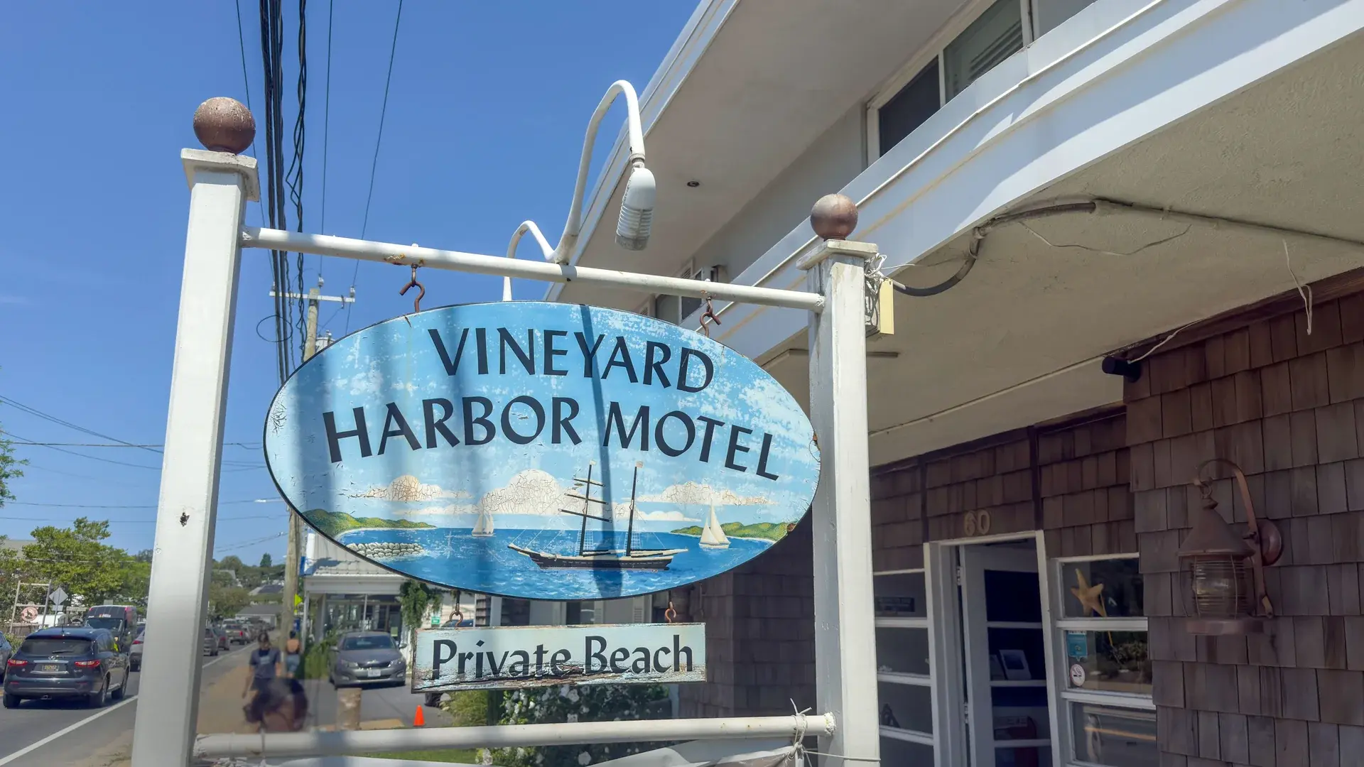 Hand-painted sign at the Vineyard Harbor Motel advertising its private beach