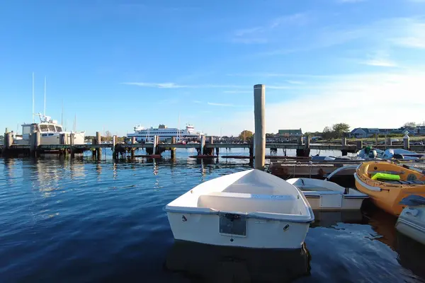 A dinghy and the ferry in Vineyard Haven Harbor