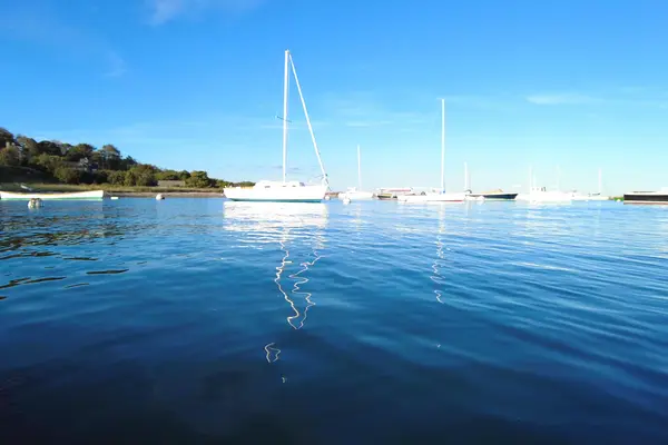 A sailboat on its mooring in Vineyard Haven Harbor